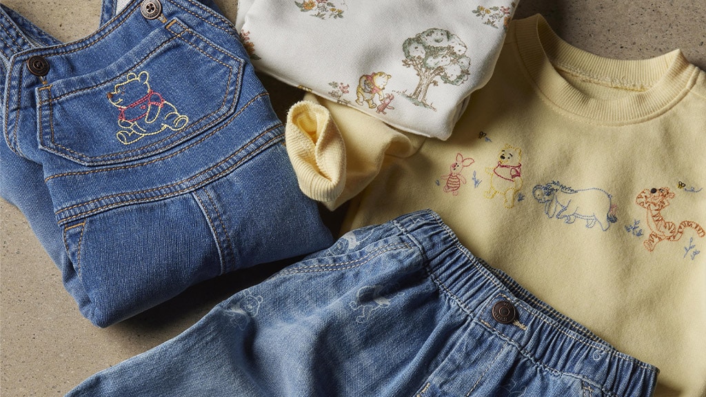 Noile haine pentru bebeluși Disney de la OshKosh B’Gosh sunt mai dulci decât mierea.