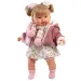 Llorens: Păpușa plângătoare Alexandra de 42 cm cu suzetă, îmbrăcată într-o jachetă roz tricotată și fustă cu flori.