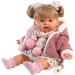 Llorens: Păpușa plângătoare Alexandra de 42 cm cu suzetă, îmbrăcată într-o jachetă roz tricotată și fustă cu flori.
